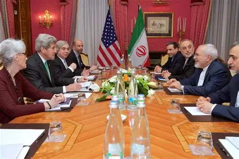 “U.S. and Iranian officials seated at a negotiation table with the American and Iranian flags behind them, symbolizing stalled diplomatic talks and rising geopolitical tension