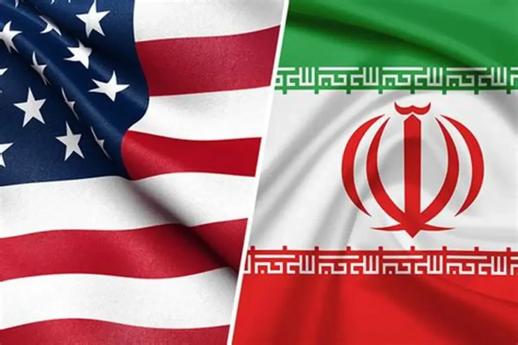 United States and Iran flags side by side symbolizing diplomatic tension and the rising US–Iran agreement expectations influencing global markets and geopolitical stability