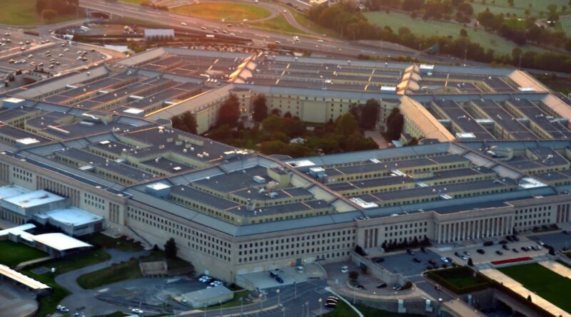 Pentagon lockdown false alarm scene captured from above, showing the iconic five‑sided building surrounded by roads and security perimeters during an emergency response.