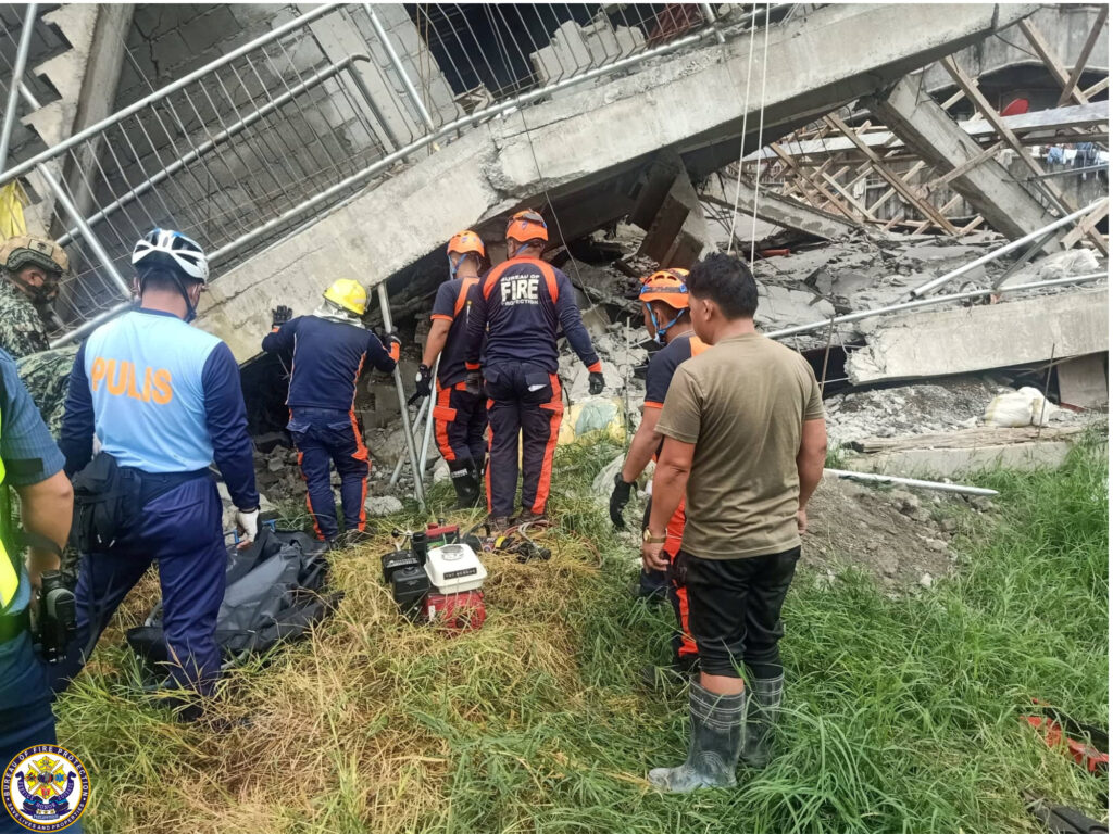 Philippines earthquake 2026 rescue teams working at a collapsed building after the 7.8‑magnitude quake.