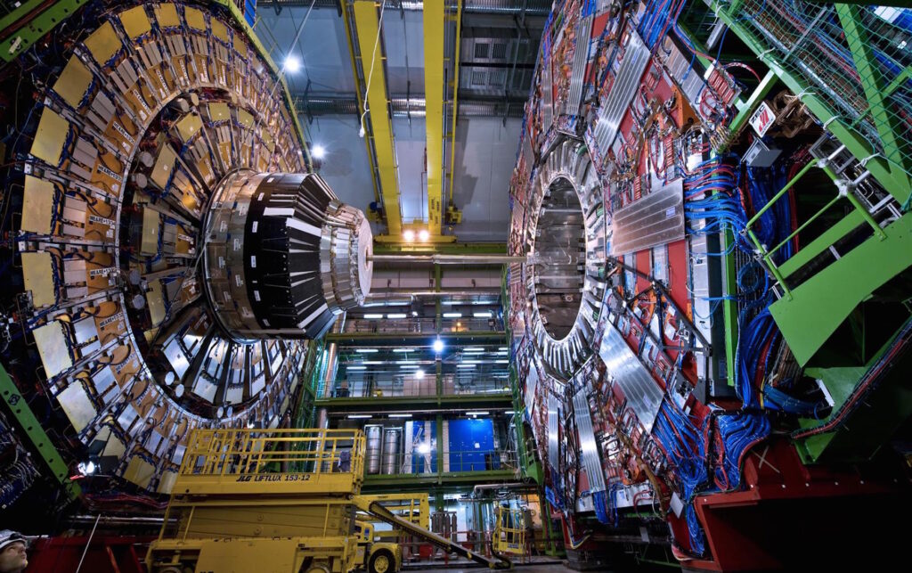 CERN Matter-Antimatter Comparison Detector During Assembly Matter–Antimatter Comparison Reaches Record Precision: CERN’s Historic ALPHA Breakthrough (2026)experiment at CERN showing a large particle detector under assembly with circular modules and instrumentation.