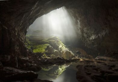 breathing caves illuminated by natural sunlight inside a deep cavern